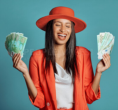 Buy stock photo Money, currency and winning the lottery with a young woman holding cash and looking happy, excited and celebrating success. Female cheering with income, savings or a return on investment in her hands