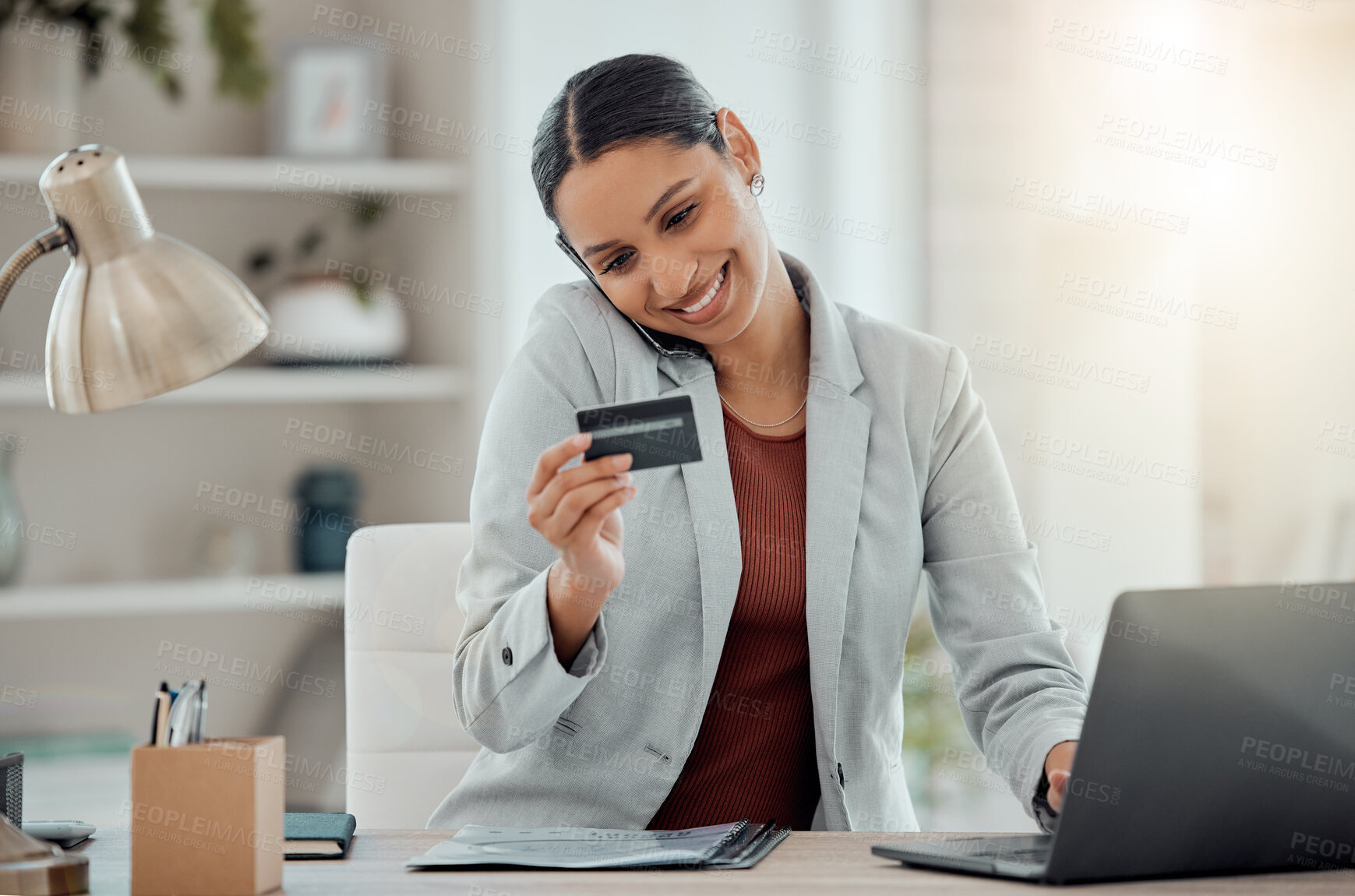 Buy stock photo Ecommerce, online shopping and secure banking of happy woman reading credit card while talking on the phone and using laptop. Smiling entrepreneur doing safe financial transaction or transfer payment