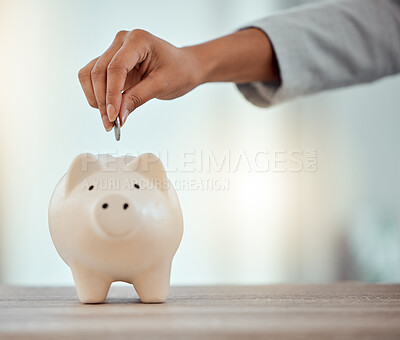 Buy stock photo Savings, investment or hand putting a coin into a piggy bank to save for future growth and financial freedom. Closeup of a female hand dropping or investing money into a retirement fund container