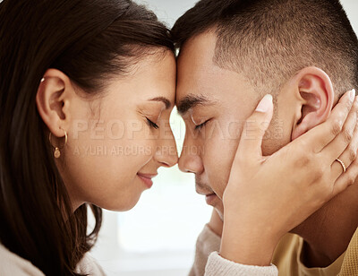 Buy stock photo Dating, man and woman with foreheads against each other in a loving and affectionate closeup. In love, young male and female couple sharing a beautiful moment and smiling after their engagement.