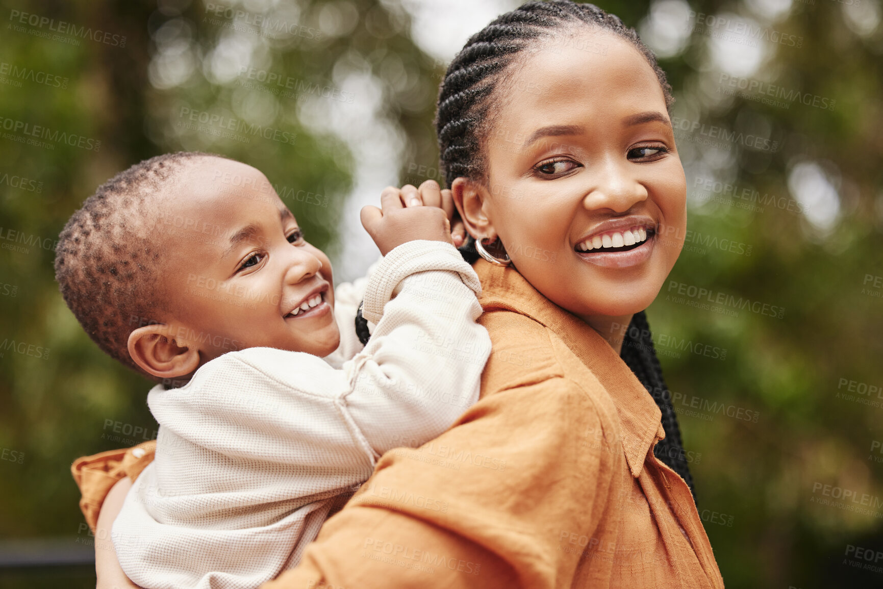 Buy stock photo Happy mother bonding with cute baby boy on piggyback while smiling, laughing and having fun play in a park outdoors. Cheerful, loving and caring mom relaxing with playful, cute and adorable child 