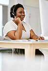 Happy, smiling and talking call center agent working on computer, networking online and helping on internet. Friendly, content and black female customer service agent planning and discussing at work