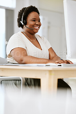 Buy stock photo Call center agent, business consultant or telemarketer assisting client on phone using headset while typing at computer desk. Contact us for excellent customer service or online faq helpdesk support.