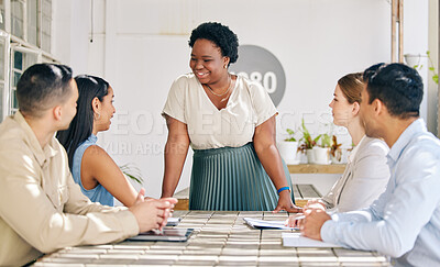 Buy stock photo Female leader talking in team meeting, collaboration and planning for a business or company project. A group of social media content writers discussing, thinking and coming up with new ideas