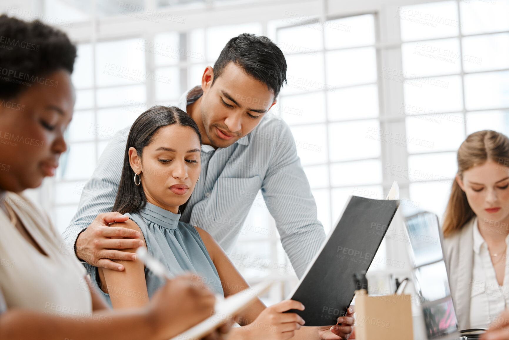 Buy stock photo Sexual harassment or abuse by a business man of a female in the office by inappropriate touching. An uncomfortable, unhappy and scared woman employee due to being molested by a colleague