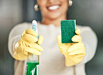 Cleaning, hygiene and sanitation with a spray bottle and sponge in the hands of a woman wearing gloves. Closeup of chores, housework and a spring clean to keep things neat, tidy and fresh