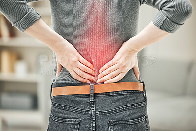 Buy stock photo Back, pain and backache of a woman touching and holding a painful area on her body highlighted in red. Closeup of a female feeling strain, ache and discomfort from a glowing muscle injury problem