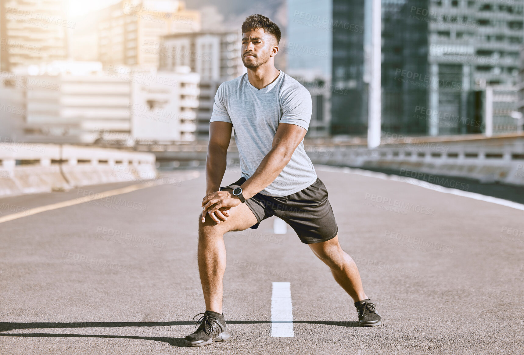 Buy stock photo Runner stretching legs for exercise, workout and fitness training for sport performance in the urban city. Motivation, active and running wellness athlete ready for sports run, marathon or health jog