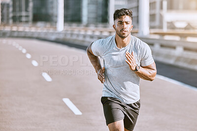 Buy stock photo Exercise, workout and training with a healthy man training for sport, fitness and wellness outside in the city. Running, exercising and working out with motivation for lifestyle, health and sports