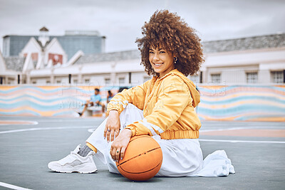 Buy stock photo Beautiful, young and female basketball coach with an afro sitting on the court outside. Portrait of a professional, confident and healthy athlete woman in sports, health and fitness.