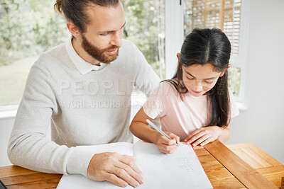Buy stock photo Father helping homeschool kid with homework, studying and learning math while writing in book at home. Caring parent bonding with young child for education development, project and assignment