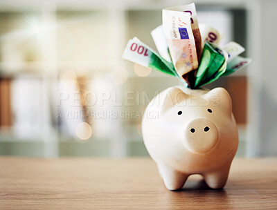 Buy stock photo Banking, finance and paper money in piggybank for future savings, budget and profit on a table for wealth. Closeup of a tool to save European cash notes, investment and financial growth on a desk