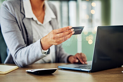 Buy stock photo Digital banking, online shopping or internet business planning of a woman holding a credit card. A female accountant at a office computer checking finance data and working with financial information