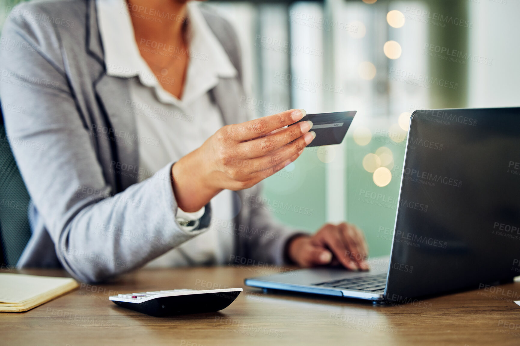 Buy stock photo Digital banking, online shopping or internet business planning of a woman holding a credit card. A female accountant at a office computer checking finance data and working with financial information