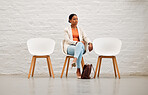 Employment, hiring and recruitment with young business woman sitting on a chair waiting for her interview with HR in a creative office. Female shortlist candidate ready for her meeting or appointment