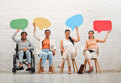 Buy stock photo Social media, copy space and sign with a team of business women sitting in line and holding speech bubble for text or talking. Portrait of females advertising and marketing with blank and empty board
