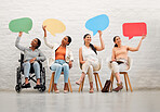 Diverse, modern young group of female colleagues holding opinion speech bubbles, thinking about news poll votes on democracy. Women with social media message icons or boards of communication messages