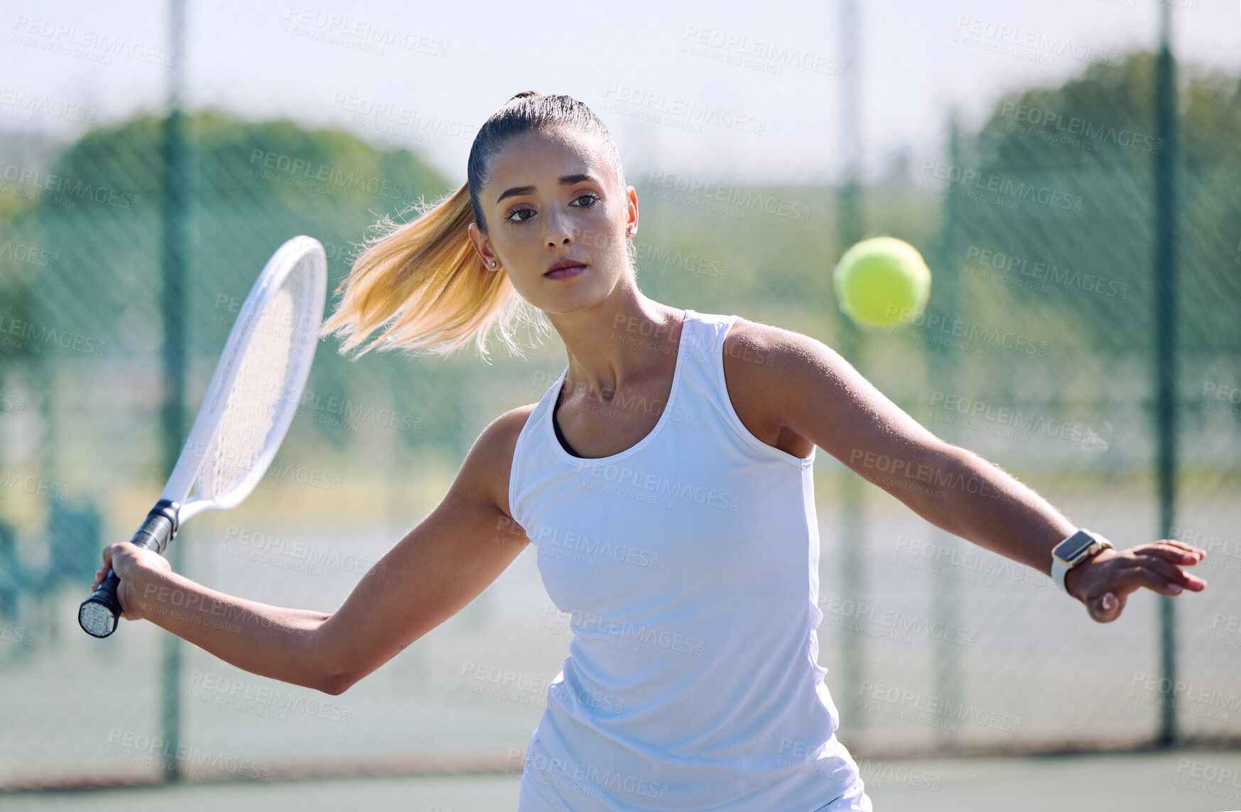 Buy stock photo  playing a serious competitive match at a sports court. Female athlete practicing her aim during a game. Woman enjoying a outdoor hobby she is passionate about.