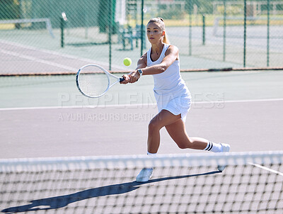Buy stock photo Active, fit and sporty athletic tennis player playing a friendly match at a tennis court. Female athlete learning to balance in a practice game. Lady enjoying fitness hobby she is passionate about.