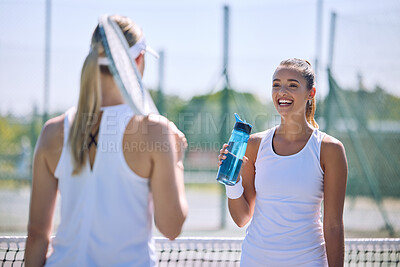 Buy stock photo Sports women, court and conversation during tennis training for match or tournament. Friendship, together and empowerment of female athletes. Friendly talking communication with sport competitor.
