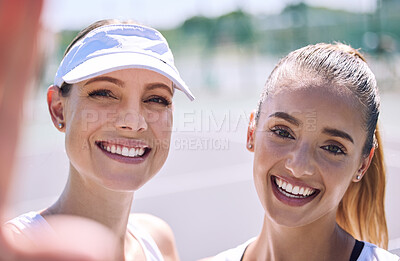 Buy stock photo Selfie of smiling, tennis and active women looking happy after a successful sporty match outdoor in the summer sunlight. Excited friends with big smile on face enjoying a friendly day on the court