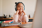 Distance learning, education and online lesson with girl wearing headphones and laptop webcam. Kindergaten or primary school Student studying with virtual video internet class with a teacher at home