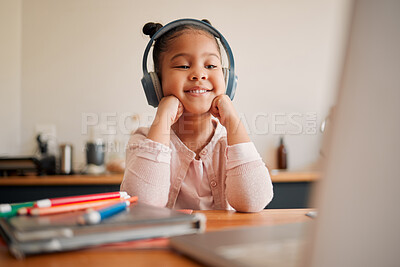 Buy stock photo Distance learning, education and online lesson with girl wearing headphones and laptop webcam. Kindergaten or primary school Student studying with virtual video internet class with a teacher at home