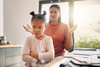 Buy stock photo Upset, discipline and family while offended and stubborn little girl looking unhappy with her scolding mother in the background. Naughty, problem and bad child angry and ignoring her parent at home 