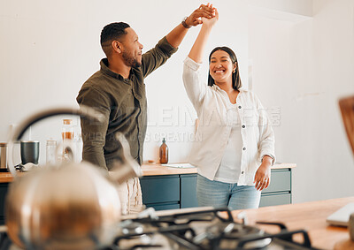 Buy stock photo Dance, love and happy couple having fun, romance and bonding while laughing, spinning and twirling together at home. Loving husband enjoying care, smile and dancing while relaxing with playful wife