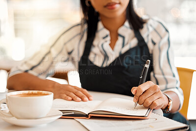 Buy stock photo Writing, coffee shop owner and cafe entrepreneur with vision ideas, planning innovation and preparing schedule or menu. Closeup hands of restaurant barista using notebook or book to calculate finance