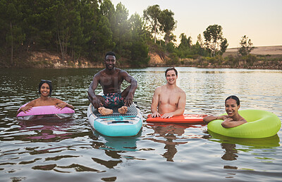 Buy stock photo Friends swimming, relax and enjoy fun summer vacation, holiday or trip to a lake portrait. Young, diverse and traveling men and woman on a youth, camp and adventure lifestyle retreat