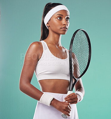 Sports woman, tennis and athlete in sportswear holding racket. Active,  player and champion looking ready to play match or tournament.  Concentration and focus before a game with copy space background