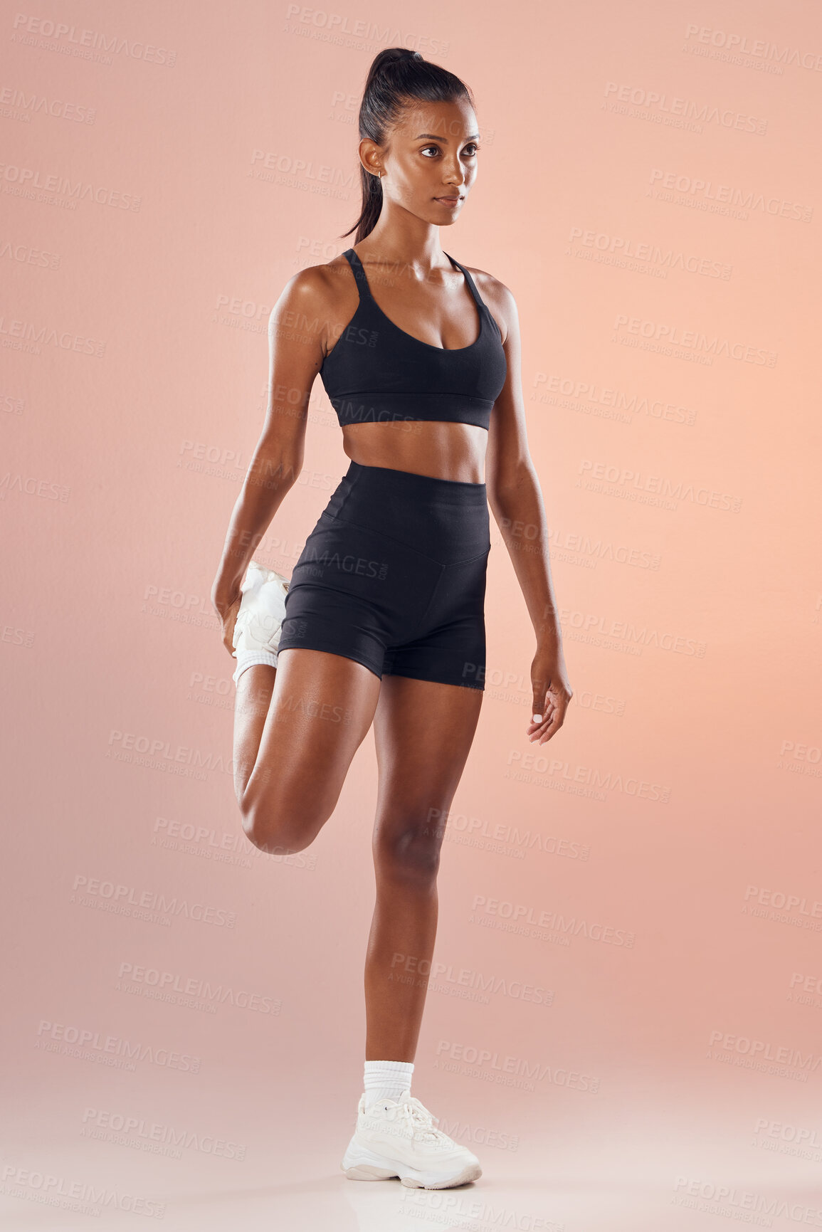 Buy stock photo Fitness, exercise and workout athlete stretching out her legs before training indoors to stay healthy and young. Active, body and sporty woman warms up strong muscles for her motivated lifestyle