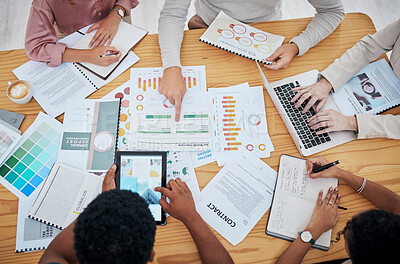 Buy stock photo Meeting, planning and finance with a group or team of business people discussing data, a contract or financial report from above. Overhead of a boardroom meeting for strategy, growth and development