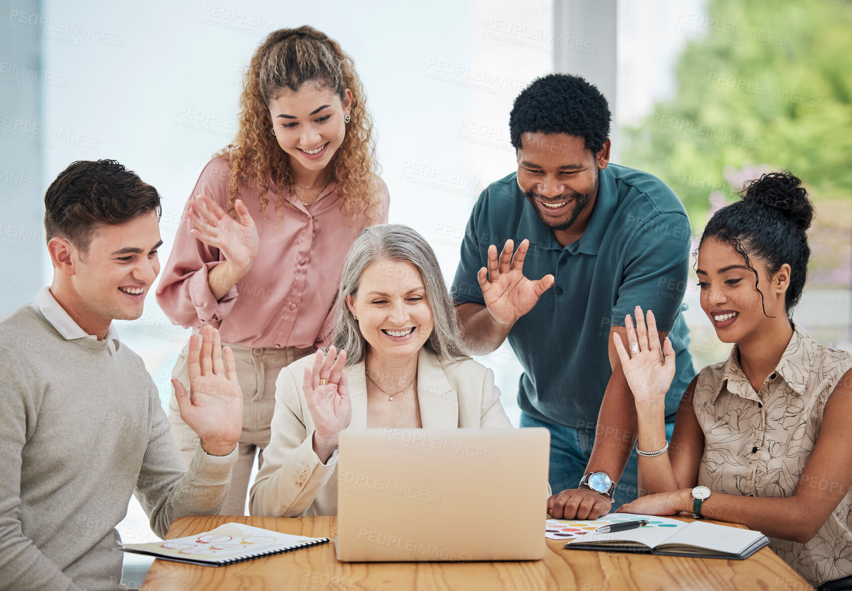 Buy stock photo Diversity, creative and corporate team on a video call while greeting a colleague on a laptop. Team waving at coworker on online zoom meeting. Business people networking on a webinar to do teamwork.