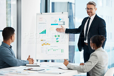 Buy stock photo Planning, strategy and a whiteboard presentation by a businessman coaching on financial growth in a meeting. Happy team leader presenting new marketing ideas to staff in training in a conference room