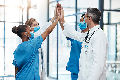Buy stock photo Covid doctors and nurses high five for teamwork success, collaboration and support in a hospital. Medical and healthcare professionals motivation, unity and community ready to work together as a team