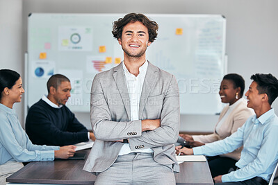 Buy stock photo Business man standing with arms crossed in meeting, leading a training workshop and looking proud with colleagues at work. Portrait of a smiling expert manager showing leadership in a seminar