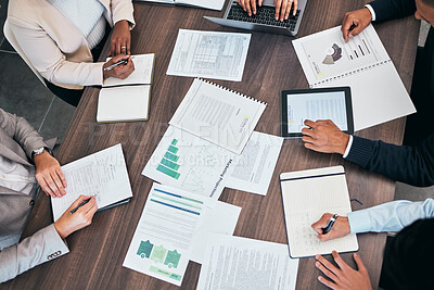 Buy stock photo Meeting, briefing and marketing strategy discussion of business people planning company growth using data. Overhead of corporate professionals or management talking and discussing graphs and charts