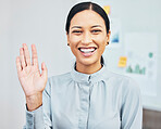 Woman waving hand to greet hello while introducing, smiling and gesturing during video call via webcam in virtual meeting in an office. Portrait of a young, friendly and happy female business intern