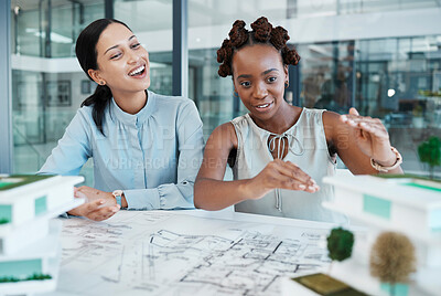 Buy stock photo Industrial engineer or architect planning building model design project in an architecture firm. Creative woman designer working on a 3d illustration and blueprint on paper on a desk with teamwork 