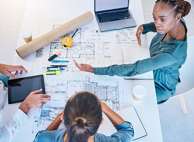 Buy stock photo Architects and business woman discuss building project plan, taking notes on laptop and digital tablet. Professional construction and engineering design firm planning real estate pricing negotiation.