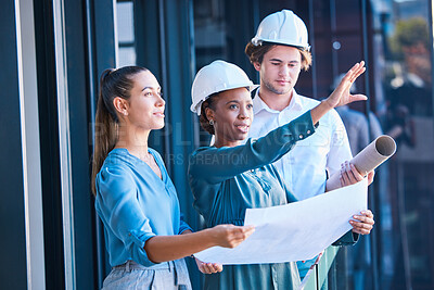 Buy stock photo Building construction management team with an architect and engineering blueprint. Teamwork development collaboration of industrial engineer group planning a architecture renovation project