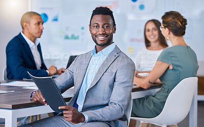 Buy stock photo Portrait of a confident business man leading a meeting in a modern office, smiling and empowered. Happy black male discussing innovative strategies, marketing, planning and creative startup strategy 