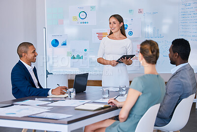 Buy stock photo Presentation, training and learning workshop in a boardroom with a female leader talking to her team during a meeting. Teamwork, strategy and collaboration with a group of people working together
