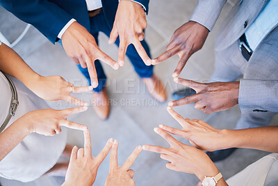 Buy stock photo Group of colleagues peace sign hands together for victory, success and unity or teamwork, collaboration and bonding. Diverse team show support, global synergy and community, united for common goal.