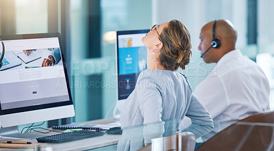 Buy stock photo Stressed, overworked or stretching sales consultant, telemarketing operator or call center agent working on website. Tired customer support employee suffering from bad posture at contact us helpdesk
