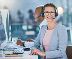 Woman call center agent working in office, employee looking confident and helping people online on computer at work. Portrait of happy customer service worker giving support at startup company