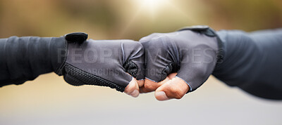 Buy stock photo Motivation, teamwork and unity with hands in gloves fist bump to show collaboration, solidarity and working together. Closeup of people showing success, community and achieving a goal as a team