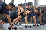 Sports people fitness training with weights at gym, workout exercise and being active at health center. Team of man and woman lifting, friends doing teamwork planks and exercising at sports club